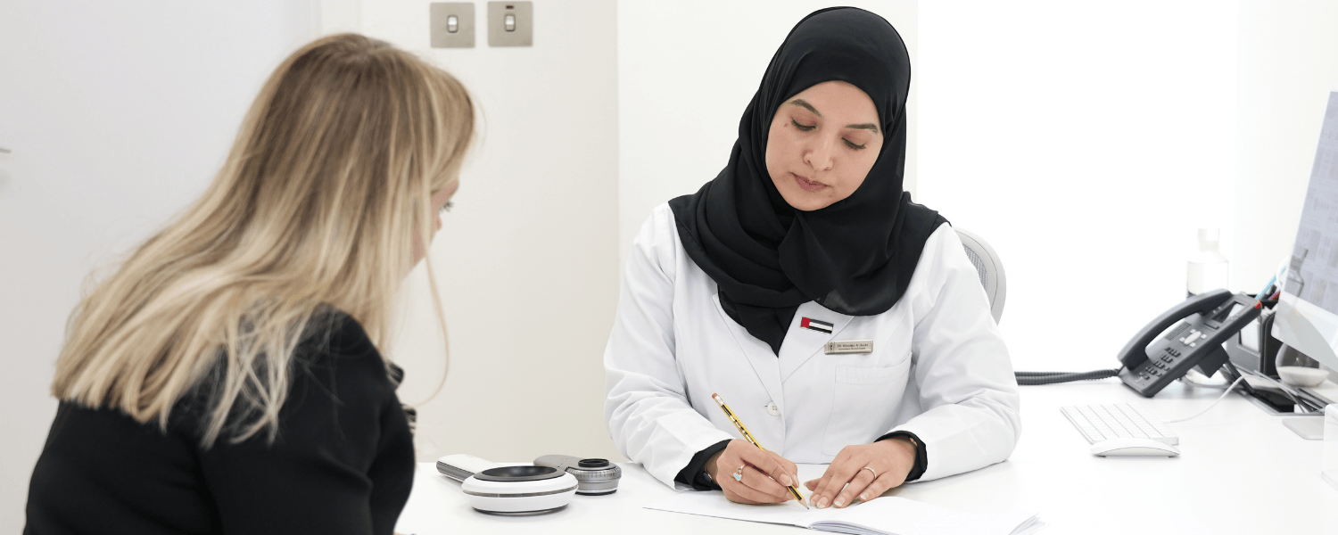 Dr. Khadija Al-Zaabi, consultant dermatologist, during a patient consultation in Abu Dhabi